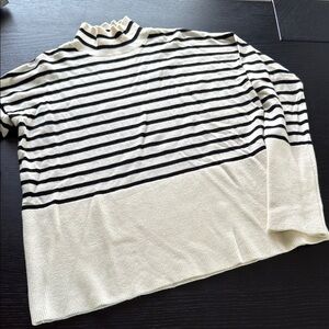 a loves a women’s black and cream striped sweater